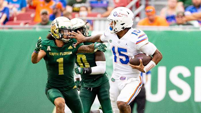 Florida QB Anthony Richardson stiff-arms a defender
